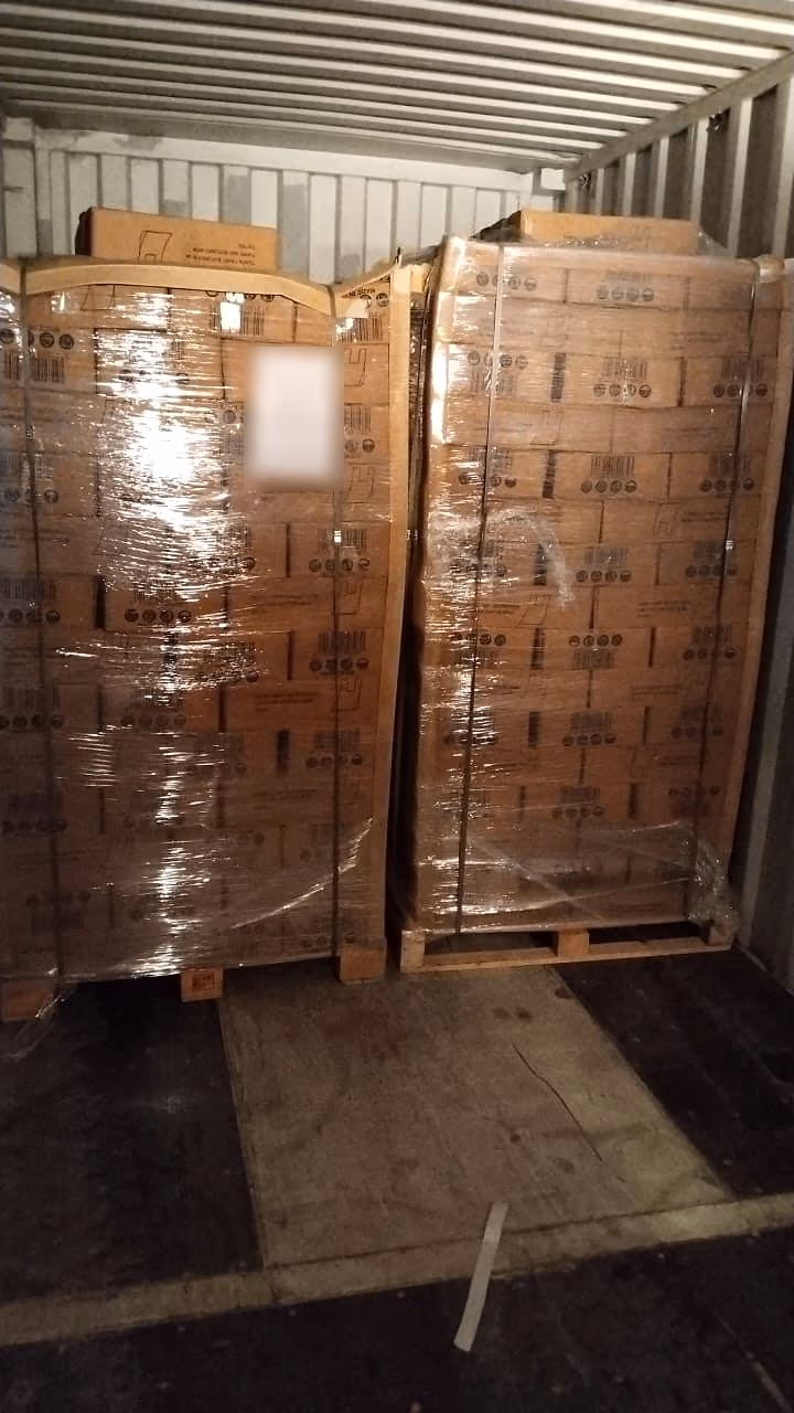 Two pallets of finished cartons secured with stretch wrap